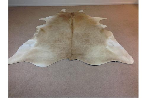 BUTTER CREAM AND WHITE COWHIDE RUG